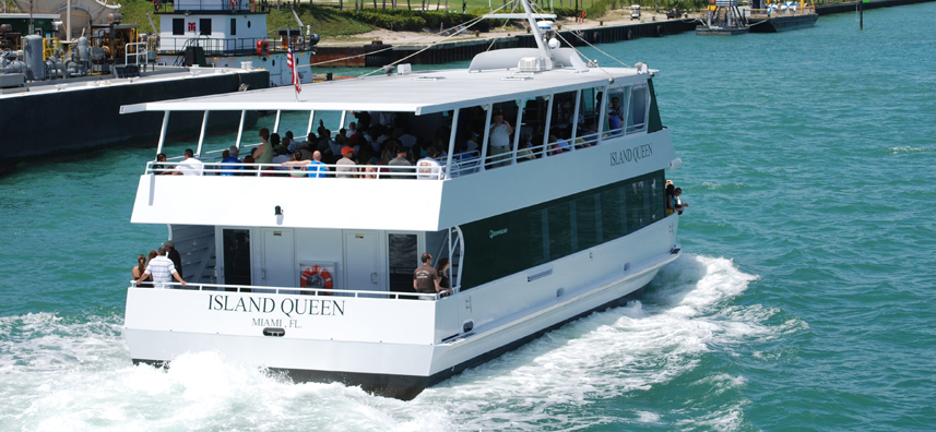 island queen yacht cruising down the river