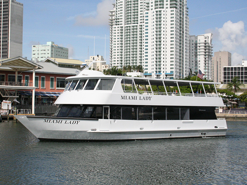 millionaires row cruise yacht on the water
